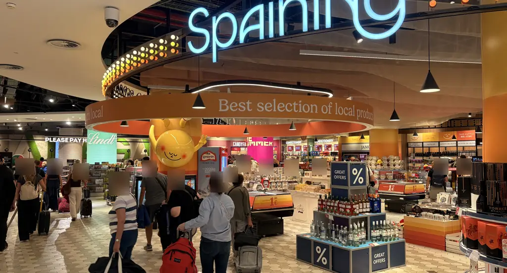 Duty-free shop at Málaga Airport with a "Spaining" section of Spanish and local products